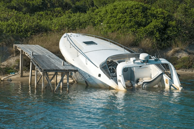 A Sunk Boat at a Dock Still Has Salvagable Parts That Can be Resold