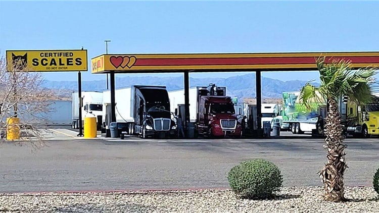 Trucks at CAT Scale Weight Station Locations
